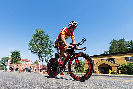 &lt;p&gt;Chris Burnett, of San Diego, races his bicycle along Lakeside Avenue in downtown Coeur d&#146;Alene during the 112-mile portion of Ironman.&lt;/p&gt;