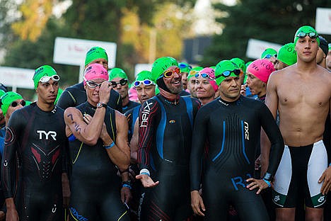 &lt;p&gt;Age group competitors line the beach before their start time of Ironman.&lt;/p&gt;