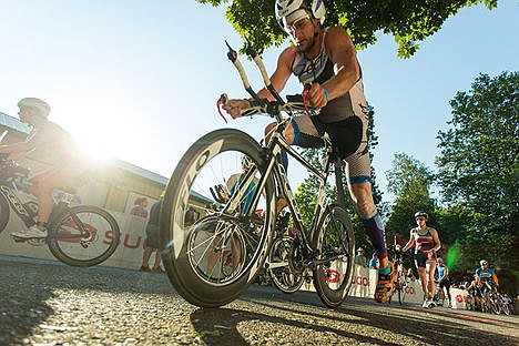 &lt;p&gt;Vaclav Kacir mounts his bike during the Coeur d'Alene Ironman on Sunday. Kacir finished the race in 12:27:47.&lt;/p&gt;