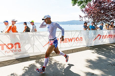 &lt;p&gt;Professional triathlete Matt Russell, of Colorado Springs, CO, races out of the shoot after completing the bike course.&lt;/p&gt;