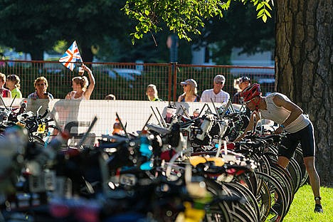 &lt;p&gt;Troy Braga, of Coeur d&#146;Alene, pulls his bike off a rack during the Ironman triathlon.&lt;/p&gt;