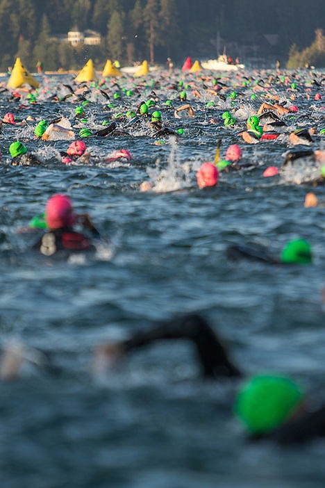 &lt;p&gt;Swimmers begin the first stretch of the first lap during the swimming portion of the Coeur d'Alene Ironman on Sunday.&lt;/p&gt;