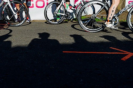 &lt;p&gt;The shadows of spectators are cast on the bicycle mounting area of the Ironman course in Coeur d&#146;Alene City Park.&lt;/p&gt;