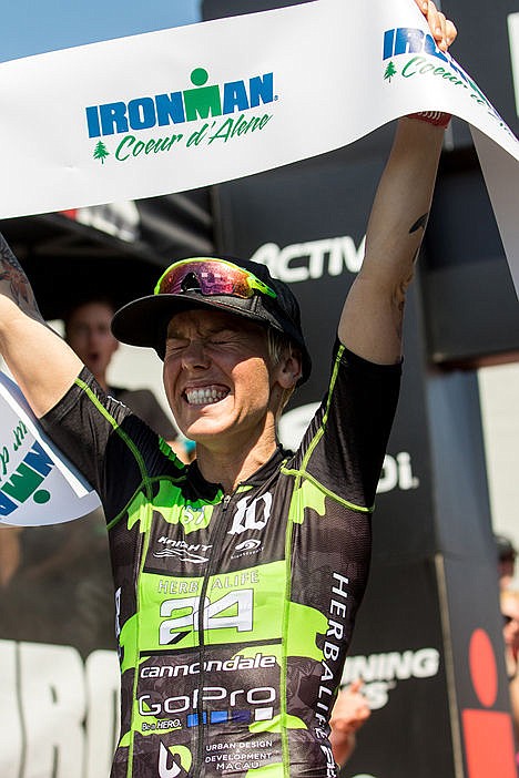 &lt;p&gt;Heather Jackson celebrates after winning the top seed of the professional women at the Coeur d'Alene Ironman on Sunday. Jackson finished in 9:23:27.&lt;/p&gt;