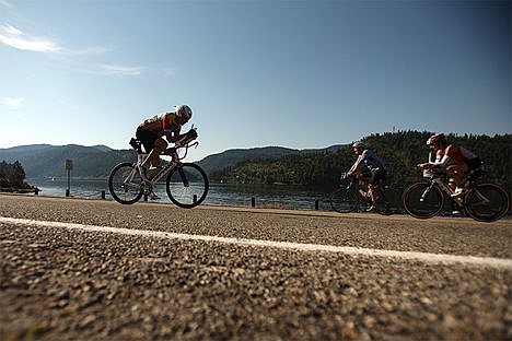 &lt;p&gt;Bob Beede of Arcata California races his bike through East Coeur d&#146;Alene Lake Drive Sunday at the Ironman triathlon.&lt;/p&gt;