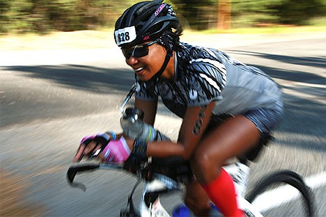 &lt;p&gt;Local Ironman participant Erin Yeck from Coeur d&#146;Alene races on her bike in the 30-34 age group on Coeur d&#146;Alene Lake Drive.&lt;/p&gt;