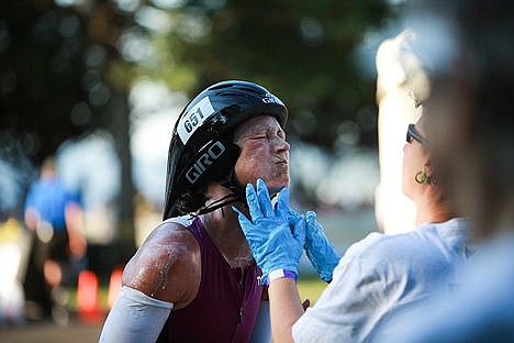 &lt;p&gt;Brigitta Gruenberg of Meridian Idaho, receives sunscreen assistance from volunteers who helped competitors with needs such as supplying water and snacks during the time of the race.&lt;/p&gt;