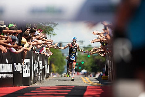 &lt;p&gt;High fives and smiles are what Andy Potts embraces as he makes his way through the finish line.&lt;/p&gt;