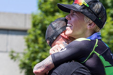 &lt;p&gt;Heather Jackson, winner of the pro-women's division of the Coeur d'Alene Ironman, hugs her husband Wattie after completing the race.&lt;/p&gt;