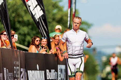 &lt;p&gt;Brian Hadley crosses the finish line at the Coeur d'Alene Ironman on Sunday. Hadley participated in the male 40-44 age group and completed the race in 11:07:16.&lt;/p&gt;