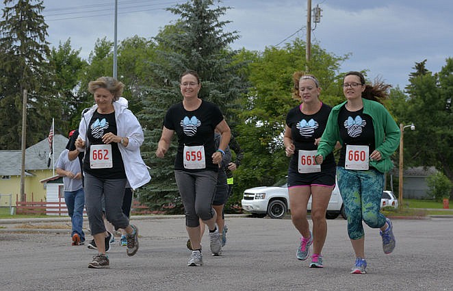 &lt;p&gt;Left to right: 4-H Hannah Vaughan and her grandmother, Michal Delgado of Ronan; mother, Amy Vaughan of Ronan; and aunt, Rebecca Schany of Texas, get a happy start at the 4th Annual 4-H Fun Run.&lt;/p&gt;