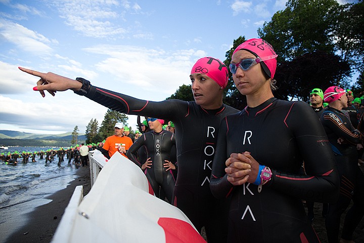 &lt;p&gt;TESS FREEMAN/Press&lt;/p&gt;&lt;p&gt;Libby Kasnick and Courtney Hayes scout the swim course before the Age Group Swim for Ironman Coeur d&#146;Alene on Sunday morning.&lt;/p&gt;