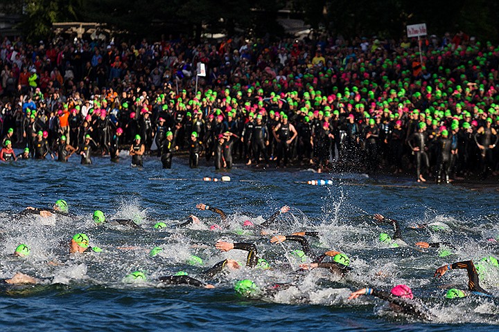 &lt;p&gt;SHAWN GUST/Press&lt;/p&gt;&lt;p&gt;Age group competitors find their pace after beginning the swim as others wait to start Sunday during the 2014 Ironman Coeur d&#146;Alene.&lt;/p&gt;