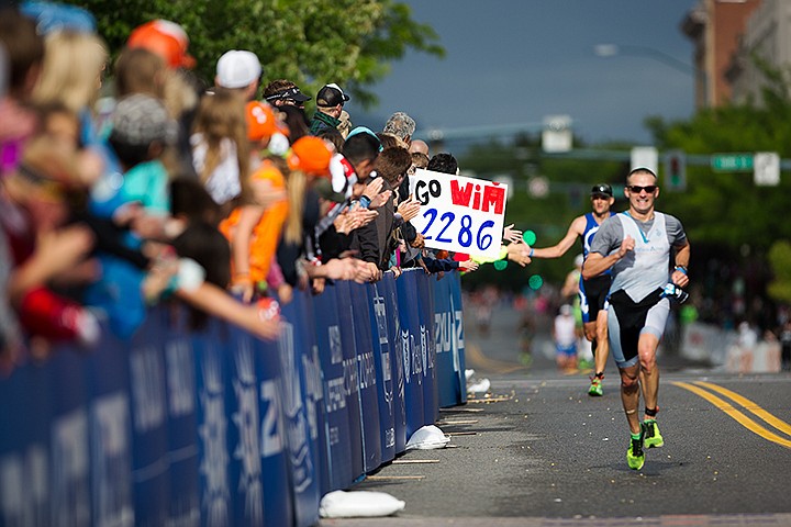 &lt;p&gt;TESS FREEMAN/Press&lt;/p&gt;&lt;p&gt;Members of the crowd cheer on the athletes as they approach the finish line for Ironman Coeur d&#146;Alene.&lt;/p&gt;