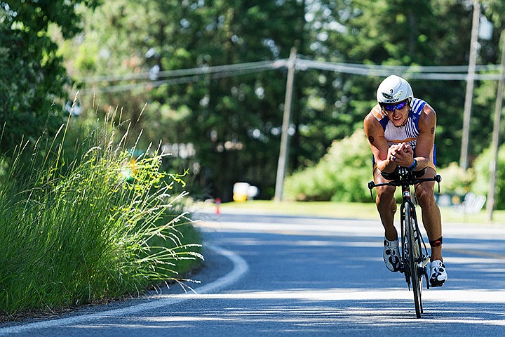 &lt;p&gt;SHAWN GUST/Press&lt;/p&gt;&lt;p&gt;Derek Garcia, of Coeur d&#146;Alene, coasts around a turn Sunday during the bike portion of Ironman.&lt;/p&gt;