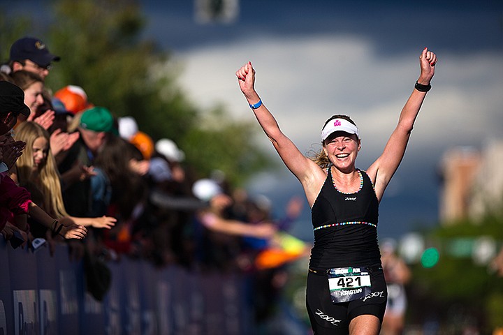 &lt;p&gt;TESS FREEMAN/Press&lt;/p&gt;&lt;p&gt;Kristin Bradfield celebrates as she approaches the finish line of Ironman Coeur d&#146;Alene. Bradfield finished with a time of 11:46:25.&lt;/p&gt;