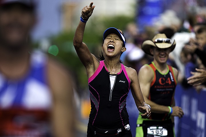 &lt;p&gt;TESS FREEMAN/Press&lt;/p&gt;&lt;p&gt;Katherine Buchowski celebrates as she approaches the finish line of Ironman Coeur d&#146;Alene. Buchowski finished with a time of 10:59:11.&lt;/p&gt;