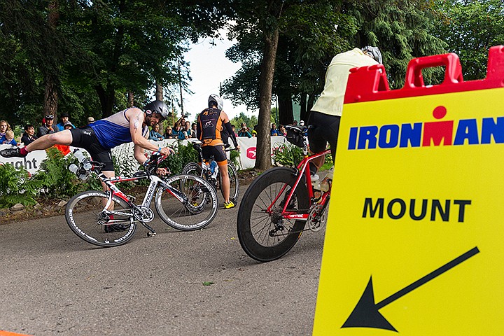 &lt;p&gt;SHAWN GUST/Press&lt;/p&gt;&lt;p&gt;Portland&#146;s Kiel Fletcher mounts his bike after crossing an official line marking the start of the 114-mile leg of Ironman.&lt;/p&gt;