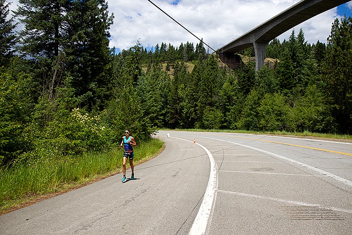 &lt;p&gt;TESS FREEMAN/Press&lt;/p&gt;&lt;p&gt;Professional Triathlete Heather Wurtele passes the eight mile marker in the run portion of Ironman Coeur d&#146;Alene. Wurtele finished first in the professional women&#146;s division of Ironman Coeur d&#146;Alene with a time of 09:34:32.&lt;/p&gt;