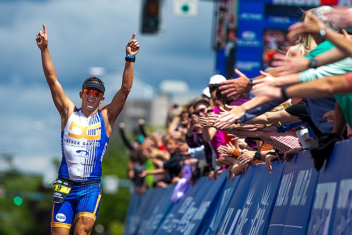 &lt;p&gt;TESS FREEMAN/Press&lt;/p&gt;&lt;p&gt;Professional Triathlete Derek Garcia of Coeur d&#146;Alene celebrates at the finish line of Ironman Coeur d&#146;Alene on Sunday afternoon. Garcia finished seventh overall with a total time of 08:57:57.&lt;/p&gt;