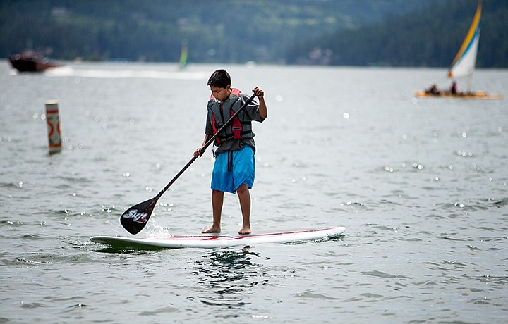 &lt;p&gt;TESS FREEMAN/Press&lt;/p&gt;&lt;p&gt;Rashaun Russell, 11,&#160;tries a stand up paddle board for the first time on Lake Coeur d&#146;Alene. Various companies brought kayaks, paddles boards, sailboats for customers to demo on Saturday.&lt;/p&gt;