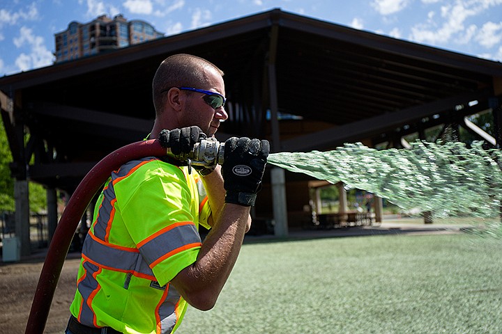 &lt;p&gt;TESS FREEMAN/Press&lt;/p&gt;&lt;p&gt;Aaron Grangaard, Construction Manager of CDF Landscape&#160;Professionals Inc., applies hydroseeding to McEuen Park on Friday morning. Grangaard has been in the landscaping field for 18 years.&lt;/p&gt;