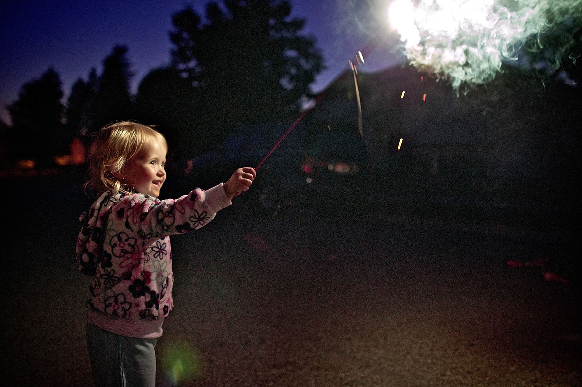 &lt;p&gt;Adi Wengliskowski plays with a sparkler in front of our house on Elderberry Circle during out Fourth of July party Wednesday, July 4, 2012.&lt;/p&gt;