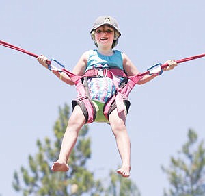 &lt;p&gt;Julianna Shumate, 8, aboard Paradise Carnival's bungee jump Saturday.&lt;/p&gt;