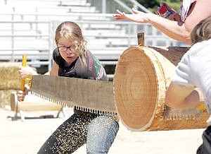 &lt;p&gt;Emily Grotbo teamed with Clay Stevenson in the Jack and Jill doublebuck saw competition.&lt;/p&gt;