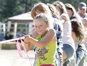 &lt;p&gt;Friday night's tug-o-war, girls against boys with Nevaeh Pattie, 8, during Logger Days 2015.&lt;/p&gt;