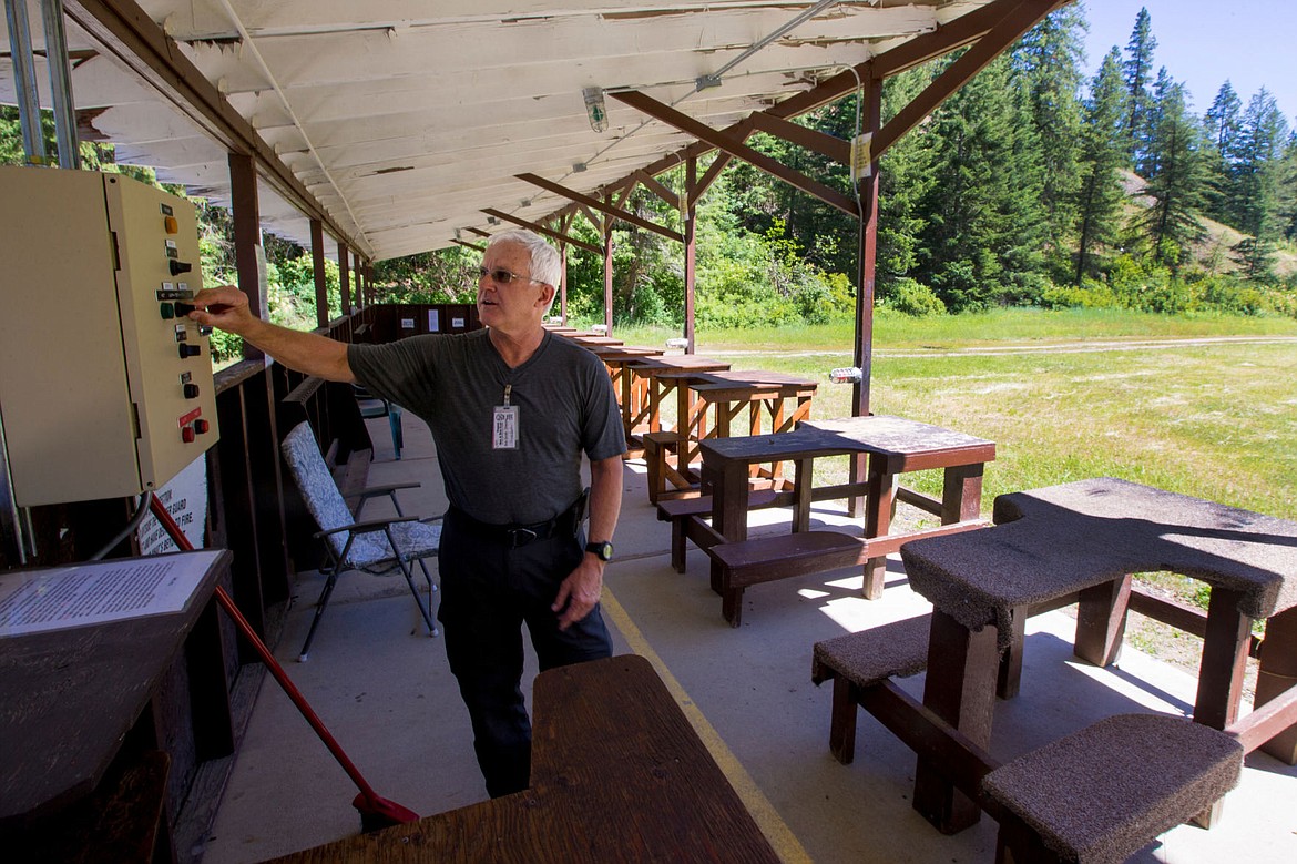 &lt;p&gt;Bob Smith tests the safety alarms installed in the rifle range shooting bay on Monday at the Fernan Rod and Gun Club's Fernan location. Alarms sound and red lights turn on if someone steps onto the range, alerting other shooters to cease fire.&lt;/p&gt;