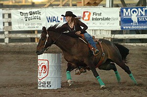 Bobbie Reeves, of St. Ignatius, turns the corner on a barrel during the barrel-racing event of the Mission Mountain PRCA Rodeo last weekend in Polson.