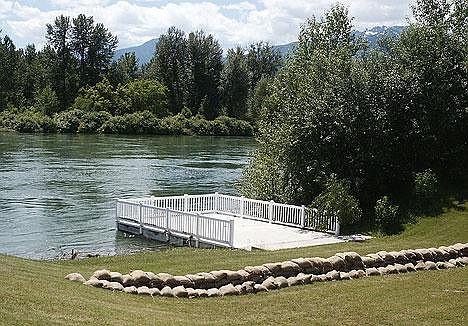 On Saturday, June 17, when the Corps bumped releases to an all-time high, Julie Shadle noticed the water creeping up her lawn and over the top of the normally dry deck near the river's edge.