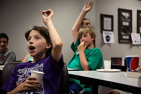 &lt;p&gt;Pierce Duncan, 12, engages in a book discussion at Hayden Public Library on Thursday. The middle school book club meets every week online and are now meeting once a month in person.&lt;/p&gt;