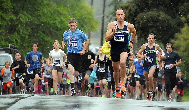 &lt;p&gt;Tevyn Stetson of Kalispell (4769), Steve Morley (4565) and his son Logan Morley (4564), both of Bigfork, set the early pace at the start of the 5K Saturday at the 37th Annual Whitefish Lake Run at City Beach. Steve Morley was the first to cross the finish line. He said he improved his time from last year by just over a minute with a chip time of 15 minutes, 55.21 seconds. He said Logan Morley posted a personal best time by almost two minutes. Logan Morley finished second in 16:14.26.&lt;/p&gt;