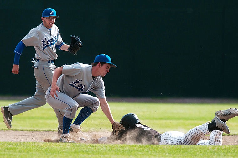 &lt;p&gt;Libby's Luke Haggerty (center) tags out Glacier's SHORT STOP (3) at second base Tuesday evening during first game of the Glacier Twins doubleheader against the Libby Loggers at Memorial Field in Whitefish. (Patrick Cote/Daily Inter Lake)&lt;/p&gt;