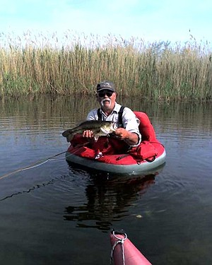 Moses Lake resident Cary Morlan fishes during a sunny afternoon.
