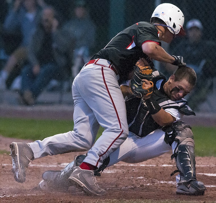 &lt;p&gt;Glacier Twins catcher Jeremy Nielsen (right) stands his ground as he tags out Kalispell Lakers' Sean O'Connell (left) at home plate Wednesday afternoon during the Lakers' win over the Twins at Memorial Stadium. Wednesday, June 27, 2012 in Whitefish, Montana.&lt;/p&gt;