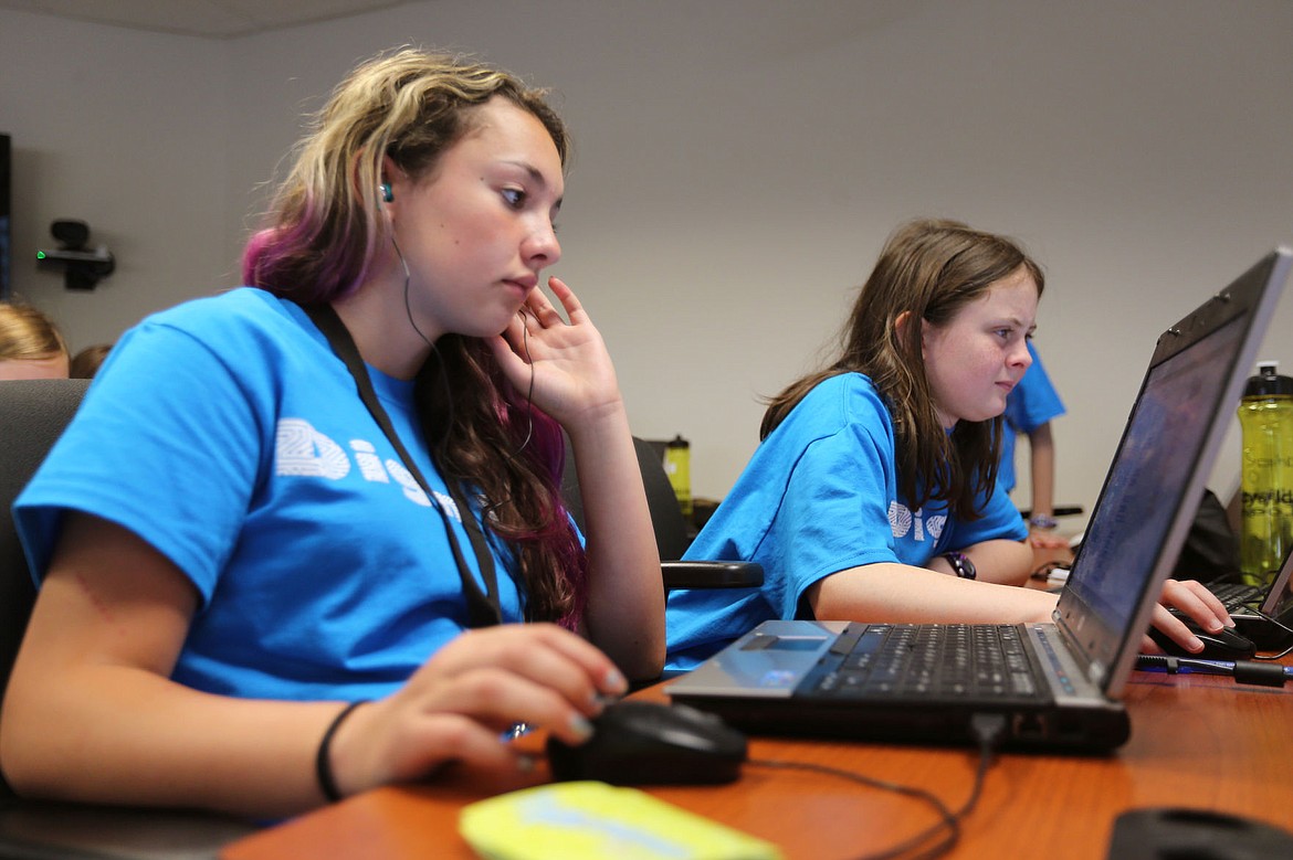 &lt;p&gt;Taylor Roberts, 13, left, and Sophia Ocker, 12, use the Scratch computer program to create videos using computer coding at the Dig' in IT Girls Coding Camp on Thursday at the University of Idaho Harbor Center in Coeur d'Alene. In the camp's fourth year, 27 middle school girls learned basic coding techniques.&lt;/p&gt;