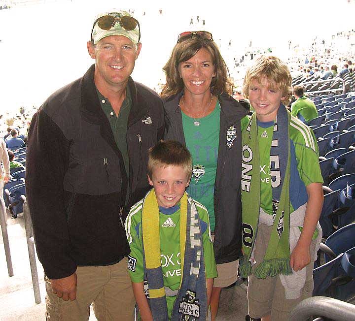 Michelle Miller with her husband, Dan and boys, Colin and Ty.