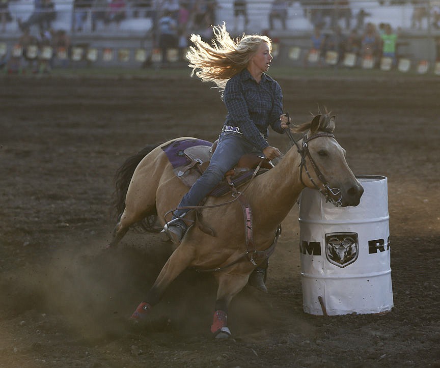 &lt;p&gt;Kylie Richter/ Lake County Leader Adriane Johnson of Charlo competes in barrel racing Saturday night at the Mission Mountain rodeo.&lt;/p&gt;