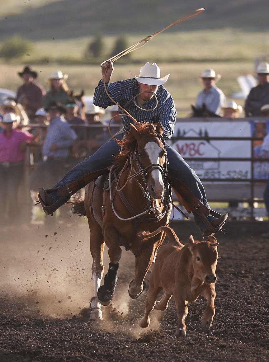 Will Powell of St. Ignatius competes in tie down roping at the 2015 Mission Mountain Rodeo. (Lake County Leader file)