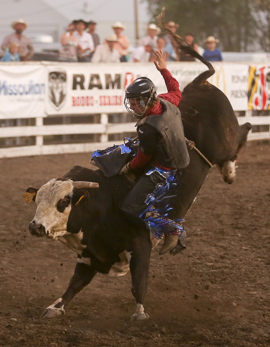 &lt;p&gt;Kylie Richter/ Lake County Leader Blaine Bauer of Ronan competes in bull riding Friday night at the Mission Mountain rodeo.&lt;/p&gt;