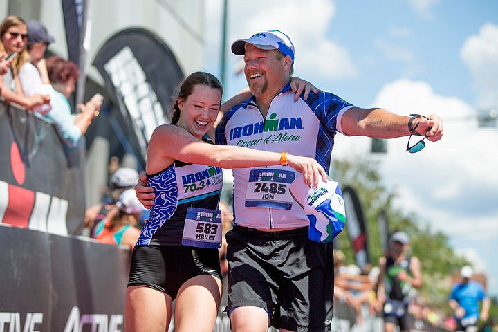 &lt;p&gt;JAKE PARRISH/Press Hailey Hoffman and her father Jon, of Dalton Gardens, embrace as they cross the finish line of the 70.3-mile Ironman Coeur d'Alene triathalon on Sunday.&lt;/p&gt;