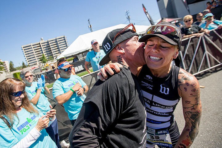 &lt;p&gt;JAKE PARRISH/Press Heather Jackson, first-place winner in the professional women's division, recieves a kiss on the cheek from her husband Sean Watkins moments after crossing the finish line with a time of 4 hours, 19 minutes and 34 seconds on Sunday at the Ironman Coeur d'Alene 70.3 triathalon.&lt;/p&gt;