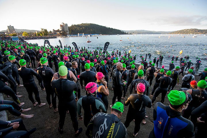 &lt;p&gt;JAKE PARRISH/Press Ironman athletes, 2449 of them, prepare themselves for the start of the 70.3-mile triathalon on Sunday at City Beach in Coeur d'Alene.&lt;/p&gt;