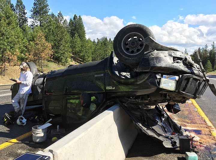 &lt;p&gt;LOREN BENOIT/Press Michael Spicer, 58, stands next to his 2004 Ford F250 after colliding with the center median divider at milepost 18 of Interstate 90 on Tuesday, June 14, 2016. Traffic was reduced to one lane, both East and West, for 2 hours and no serious injuries were reported.&lt;/p&gt;