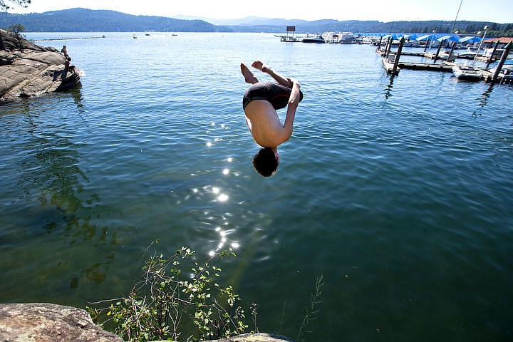 &lt;p&gt;JAKE PARRISH/Press Ben Blakely, 14, does a front flip into Lake Coeur d'Alene from Tubbs Hill on Monday.&lt;/p&gt;