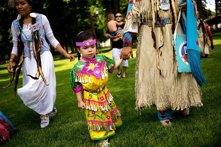 &lt;p&gt;JAKE PARRISH/Press Unity Gerbais-Lawrence, 3, walks amongst fellow Coeur d'Alene Tibe members during a ceremonial dance.&lt;/p&gt;