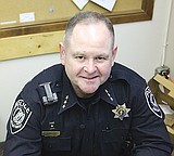 Warden examining ordinance on false alarms